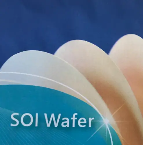 Close up of SOI wafers with a blue background.
